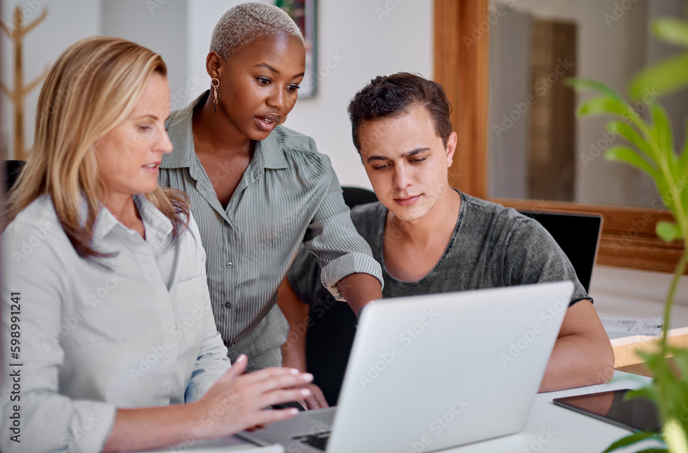 Their company is successful because of the passion of its employees. a group of businesspeople working together on a laptop in an office. Their company is successful because of the passion of its employees. a group of businesspeople working together on a laptop in an office.