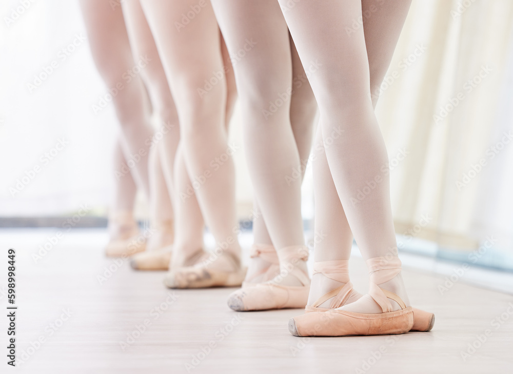 Ready for the performance of a lifetime. a group of ballerina dancers practicing a routine in their pointe shoes. - obrazy, fototapety, plakaty 