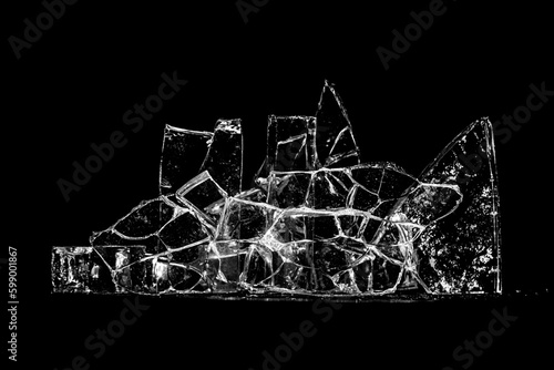 cracked glass in black light , macro black glass