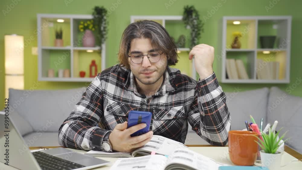 The young man who receives a bad notification, message, mail is frustrated. The young man who receives a bad notification, message, mail is frustrated.