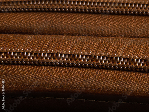 Close up large format file of a zipper from a wallet