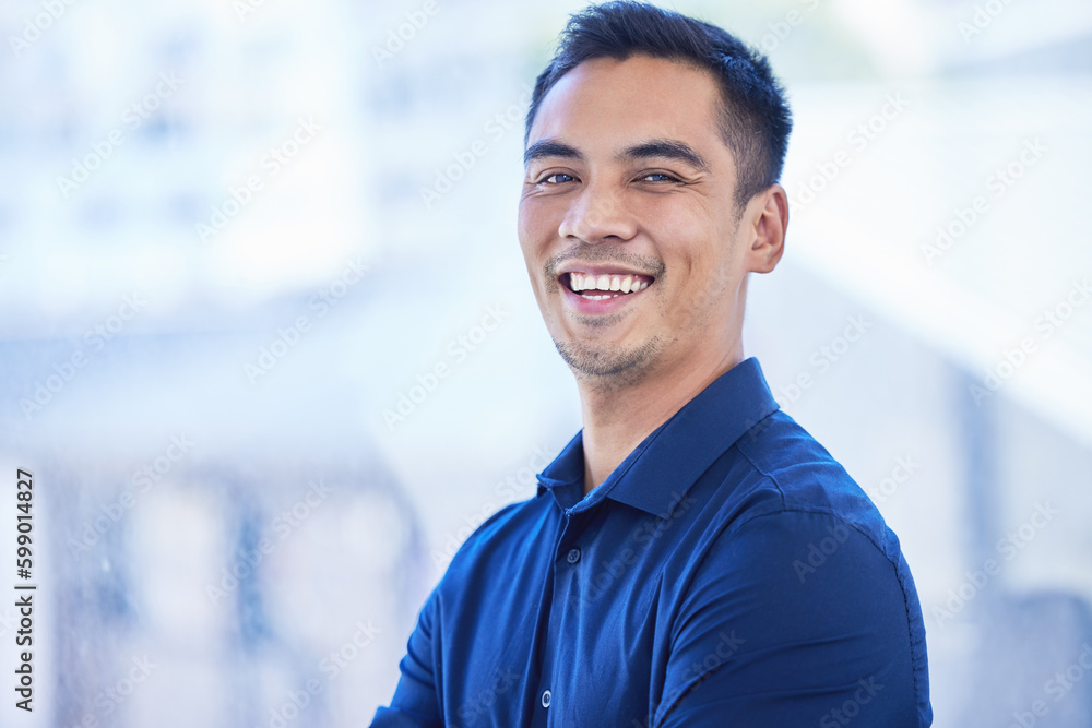 Business has been thriving under his leadership. Portrait of a confident young businessman standing in an office. Business has been thriving under his leadership. Portrait of a confident young businessman standing in an office.