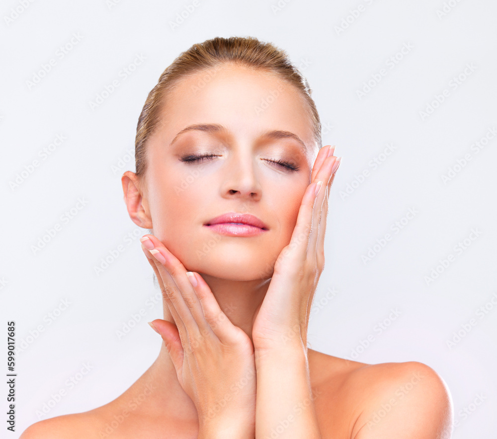 Skin so soft you have to adore it. Naturally beautiful blonde woman with flawless skin touching her face dreamily, isolated on white. Skin so soft you have to adore it. Naturally beautiful blonde woman with flawless skin touching her face dreamily, isolated on white.