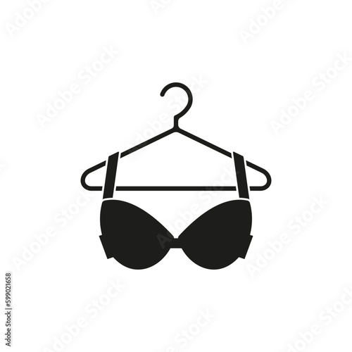 Bra is on hanger icon. Vector. Flat design.