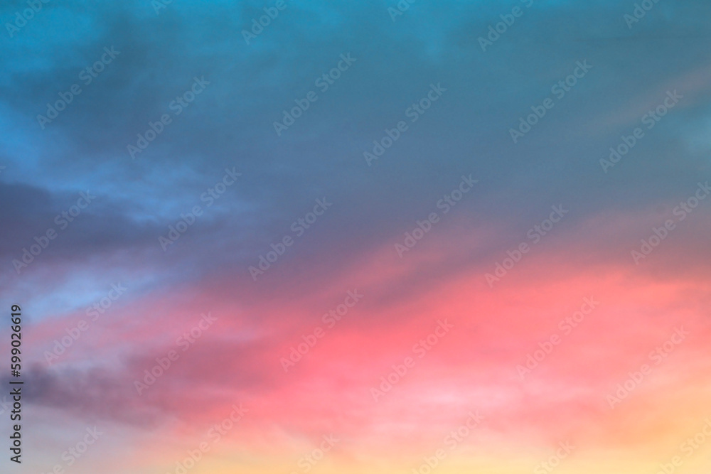 Pink sky and clouds background at dusk.