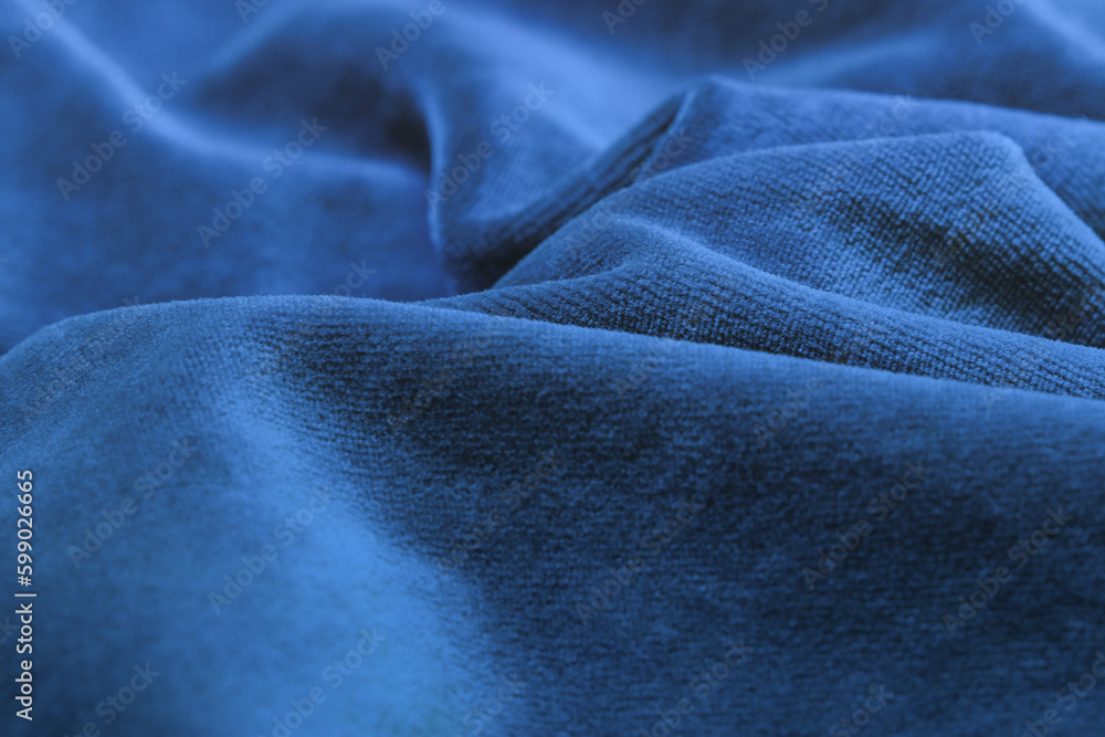 Fototapeta premium Beautiful dark blue velvet fabric.