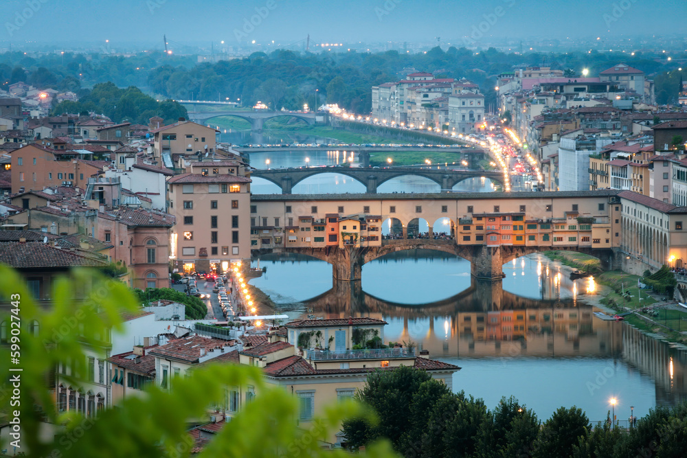 The Ponte Vecchio Bridge crossing the river Arno in Florence, Italy