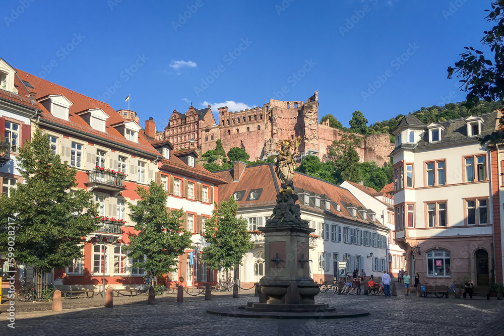 Cityscape of Heidelberg, Germany with Karlsplatz and castle on a sunny afternoon