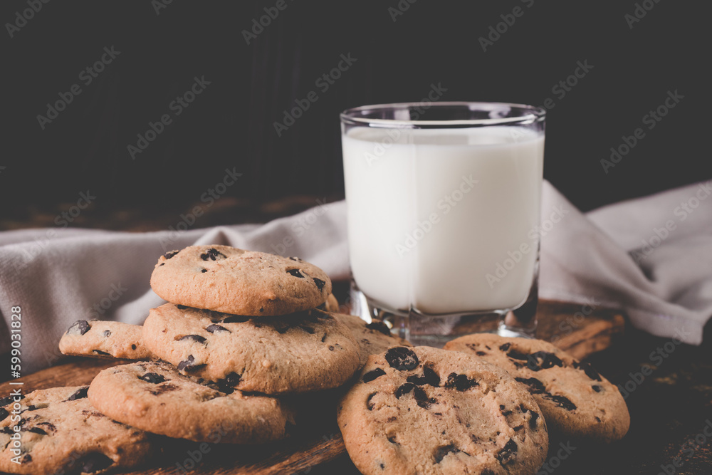 fresh healthy milk and cookies on dark wood background fresh healthy milk and cookies on dark wood background