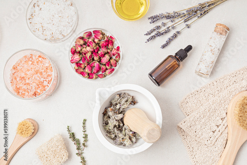 Preparation of homemade cosmetics and aroma bath salt. Zero waste, eco friendly diy beauty products ingredients on light background, flat lay, top view