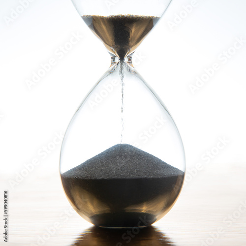 hourglass on a light background. time and minute measurement