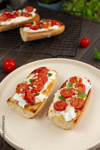 Bruschetta with dried tomatoes and strachatella cheese