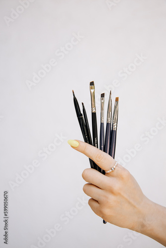 hand holding brush