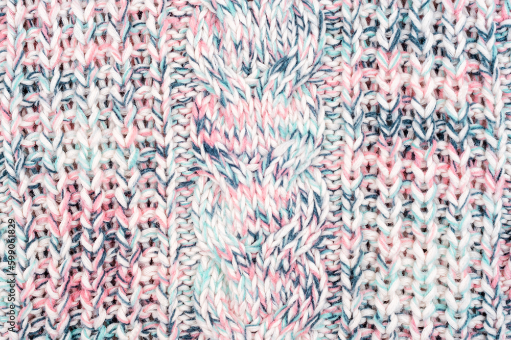 Melange woolen knitted sweater fabric, texture, background Melange woolen knitted sweater fabric, texture, background