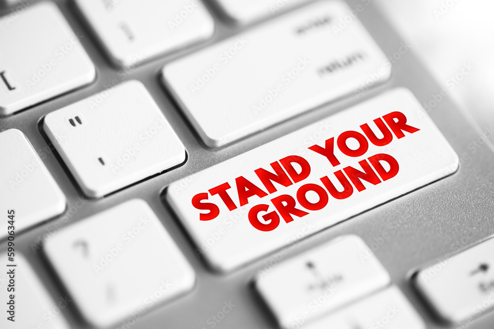 Stand Your Ground text button on keyboard, concept background Stand Your Ground text button on keyboard, concept background