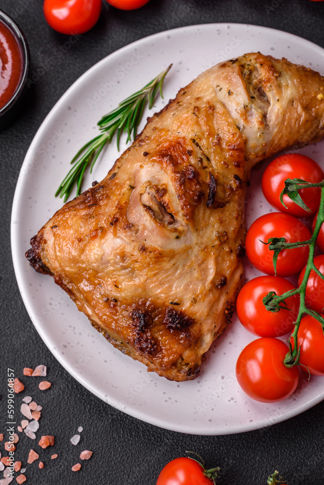 Fresh grilled chicken leg with salt, spices and herbs Fresh grilled chicken leg with salt, spices and herbs