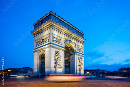 Arc de Triomphe de l Etoile at the top of the Champs-Elysees boulevard by night, Paris, France © pyty