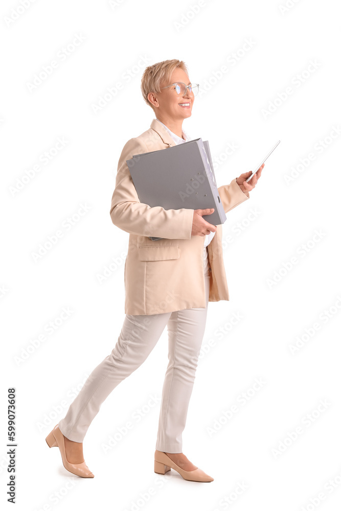 Mature businesswoman with folders and tablet computer on white background Mature businesswoman with folders and tablet computer on white background