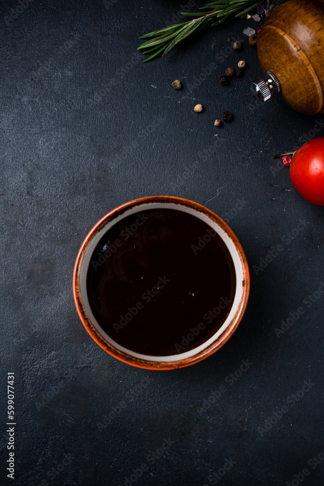 Fresh soy sauce in a small ceramic bowl.