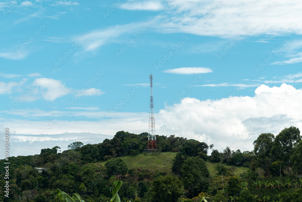 Communication antenna in the city and beautiful blue sky. Colombia. Communication antenna in the city and beautiful blue sky. Colombia.