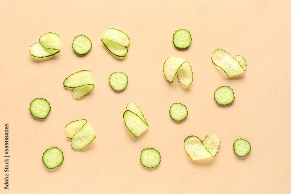 Slices of cucumber on beige background Slices of cucumber on beige background