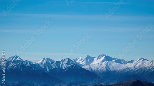 A mountain range with snow-capped peaks and a blue sky. Generative AI 