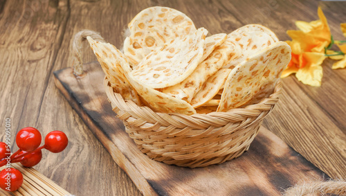 Tempe or Keripik Tempe. Tempeh chips a typical Indonesian food. It's served on bamboo basket