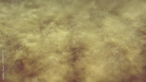 Underwater sandy sea bottom. Water Waves Mixing the sand. Slow motion Seamless loop. Abstract background. 