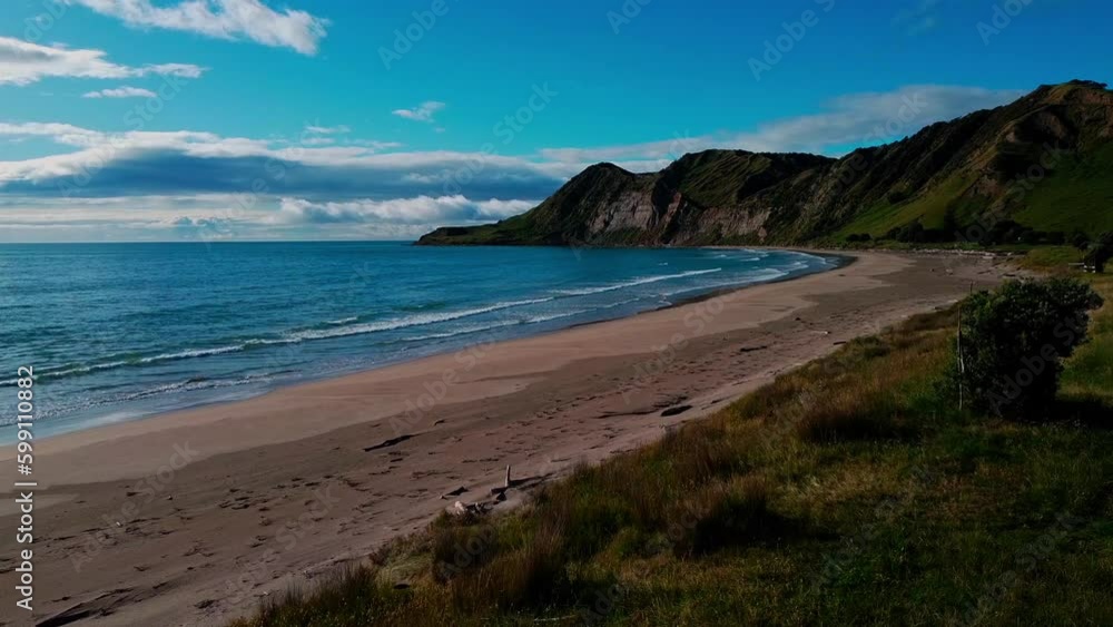 Kaiaua Bay drone shot of beach and cliff. Kaiaua Bay drone shot of beach and cliff.