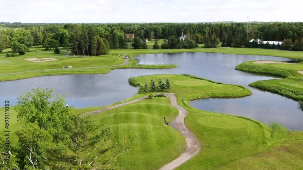 Drone flying over ponds and lakes on an Oakville golf course. Drone flying over ponds and lakes on an Oakville golf course.