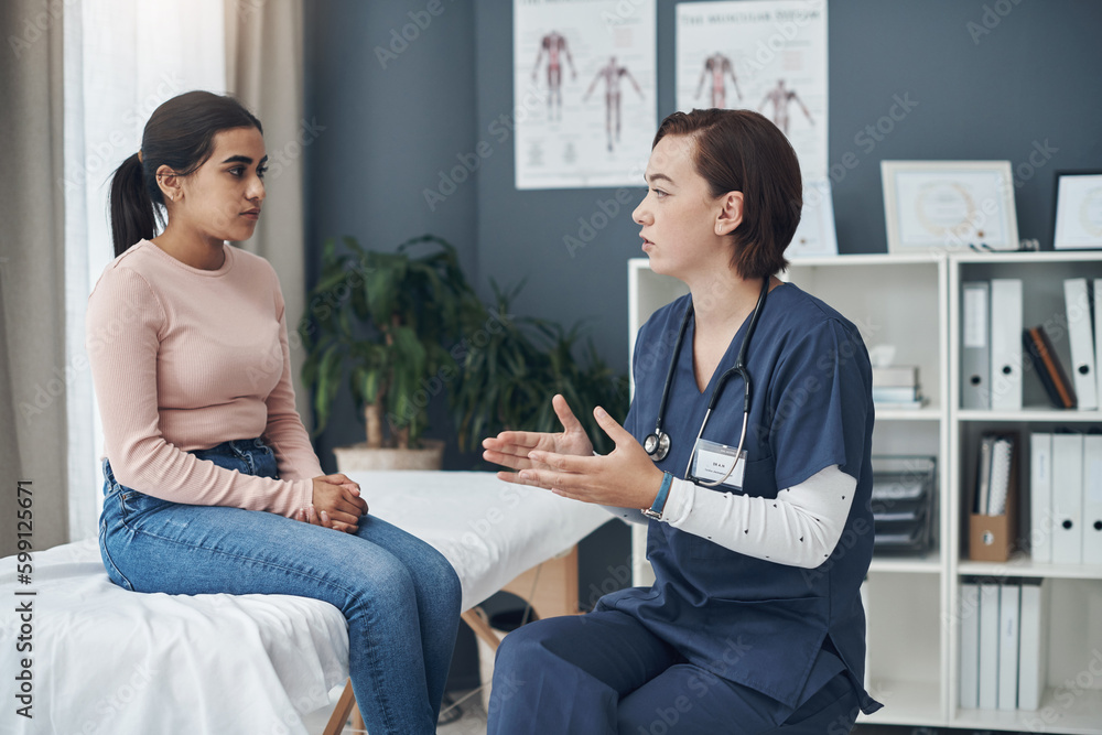 This is what you need to do. a young female doctor talking to a patient in an office. This is what you need to do. a young female doctor talking to a patient in an office.