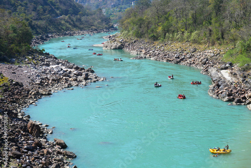 Photography Top view of the Ganges river and rafting boats floating down it.