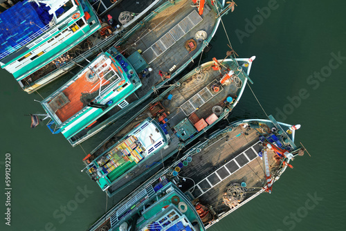 Canvastavla asian fisherman boat ,docks at the harbor