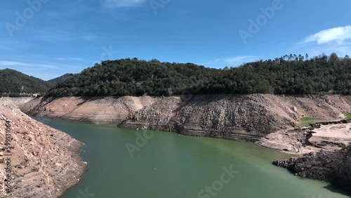 Aerial view of Vilanova de Sau reservoir dry banks, forward, Catalonia, Spain photo