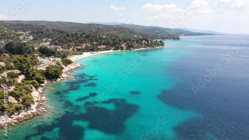 Aerial view on the Koviou beach on the coast of the Sithonia, Greece. Top view from drone. photo