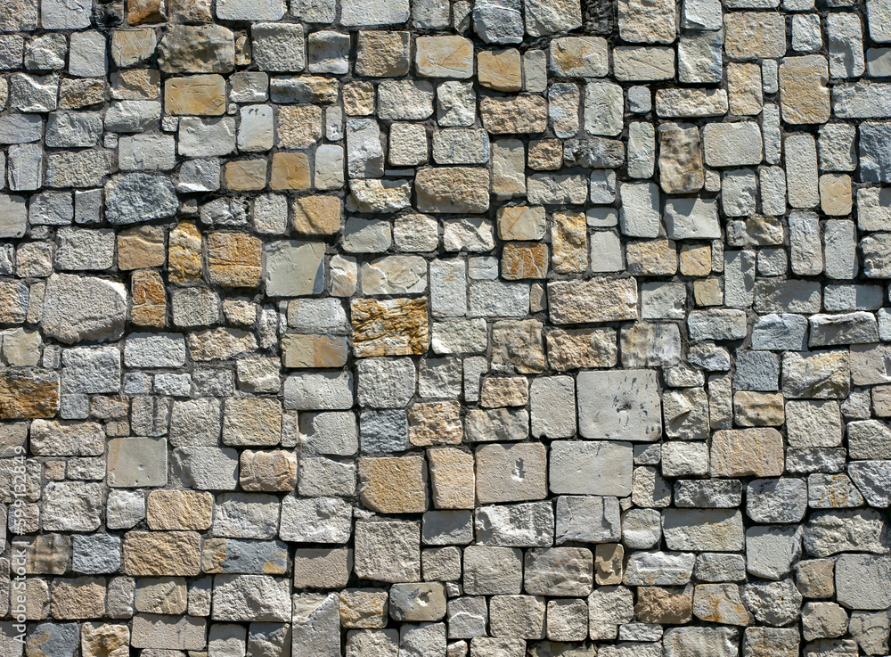 Surface of the stone wall for background and wallpaper