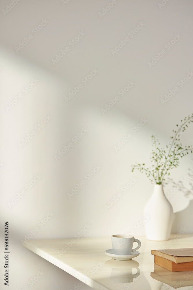 Vases and objects on the table in a warm room with sunlight coming in Vases and objects on the table in a warm room with sunlight coming in