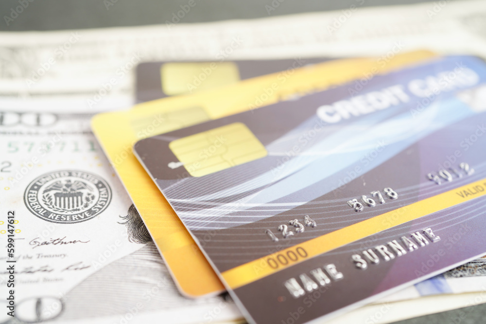 Credit card with password key lock and US dollar banknote money, security finance business concept. Credit card with password key lock and US dollar banknote money, security finance business concept.