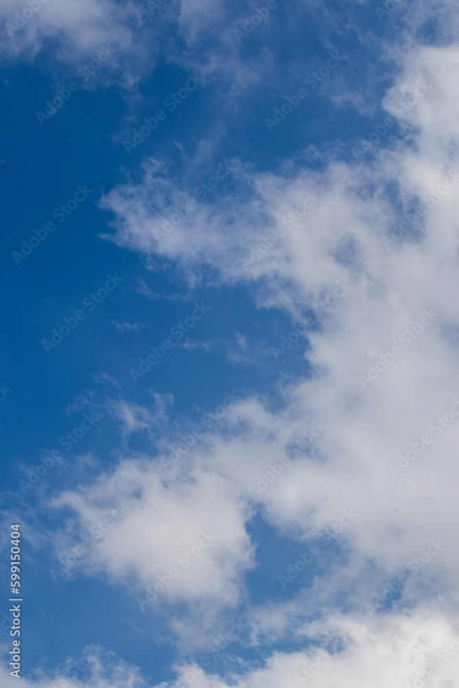 Cloudscape in blue and white with copy space for background use