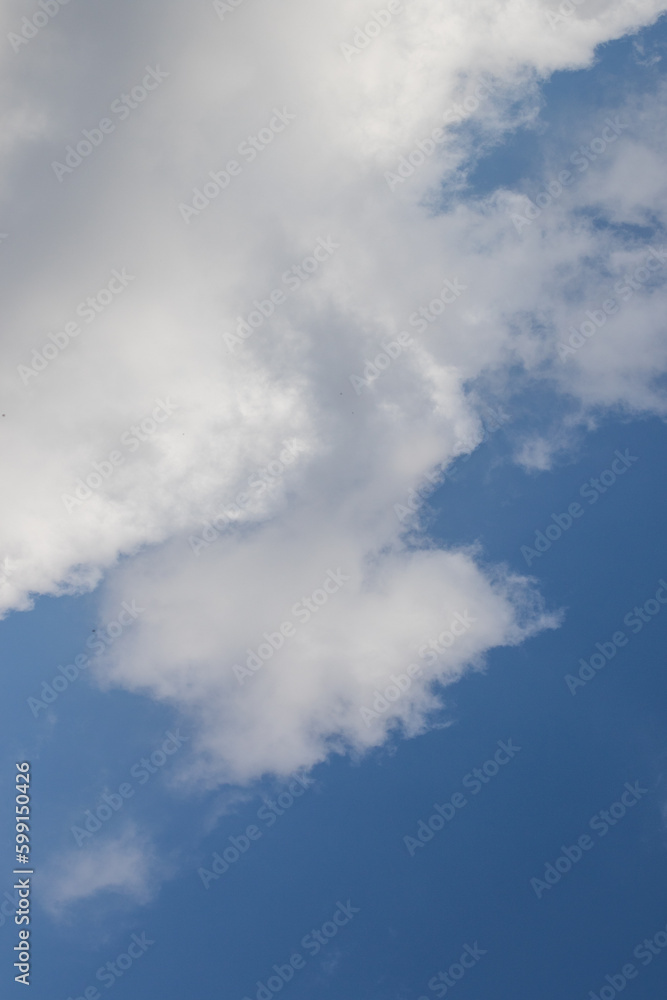 Cloudscape in blue and white with copy space for background use Cloudscape in blue and white with copy space for background use