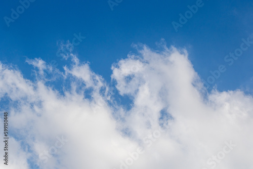 Cloudscape in blue and white with copy space for background use