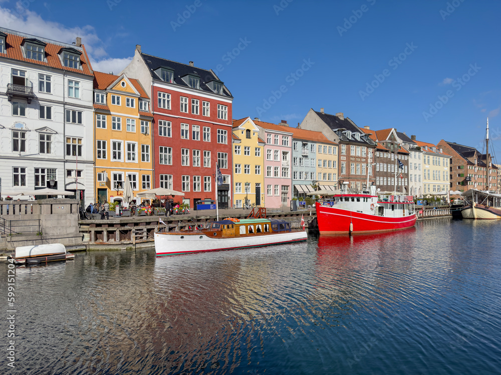 Nyhavn  old boats -Walking along Copenhagen's canals on a beautiful spring day, Denmark, Europe