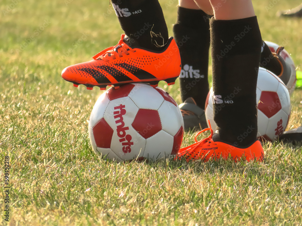 Calgary, Alberta. Canada. May 3, 2023. A kid using Adidas Predator Accuracy Soccer  Cleats Shoes. Concept: Football soccer season. Stock Photo | Adobe Stock