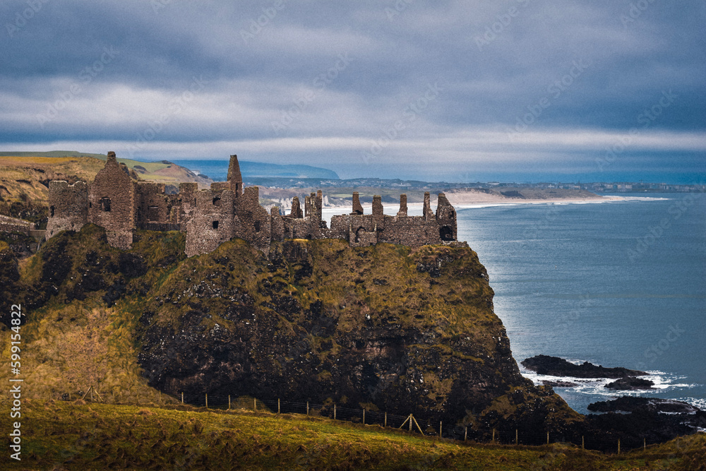 ruined castle on cliff in Ireland