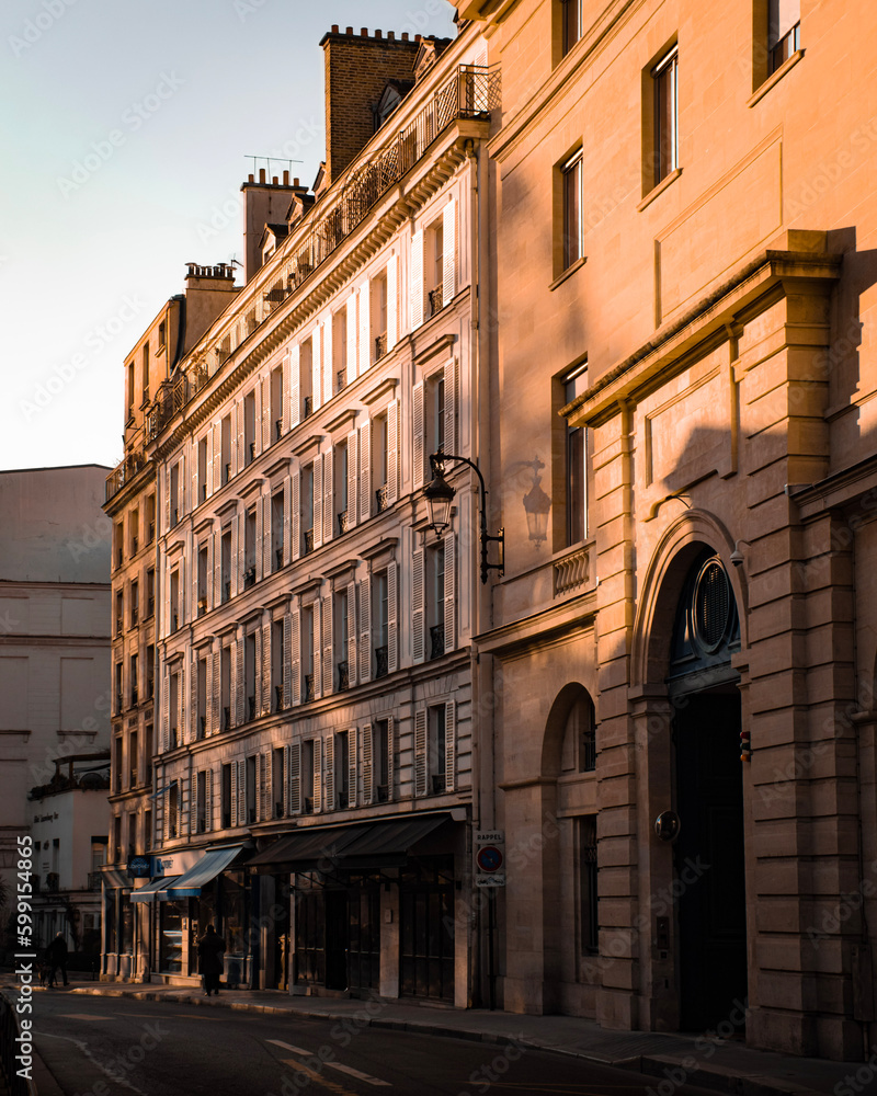 Sunbeams over building in paris street