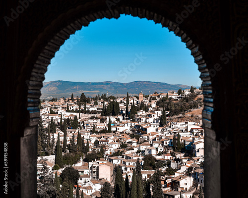 white houses of Granada from Alhambra window