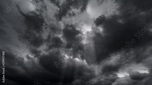Leinwand Poster dark dramatic sky with black stormy clouds before rain or snow as abstract backg