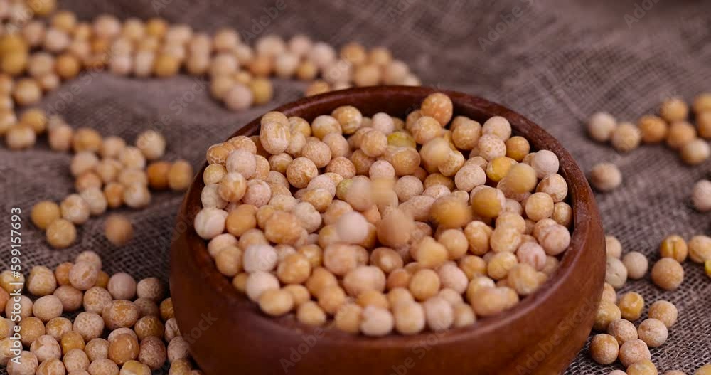 pour dry yellow peas scattered before cooking, Dry hard yellow peas for cooking porridge pour dry yellow peas scattered before cooking, Dry hard yellow peas for cooking porridge