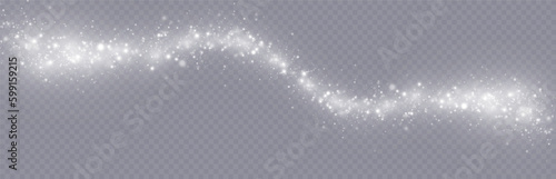 Particles of white magic dust. Shining light particles.Christmas glitter particles. Light effect on a transparent background