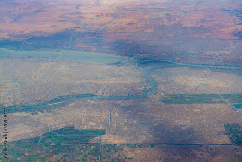 Aerial view of the metropolitan area of Khartoum the Capital of Sudan, located at the confluence of the White Nile and the Blue Nile in North Africa with agricultural field around the Nile